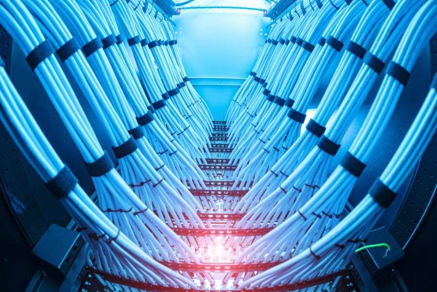 Reels of medium voltage cable staged on a data center construction site